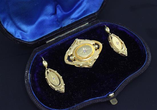 A cased Victorian gold and rose cut diamond set demi parure, brooch 1.25in.